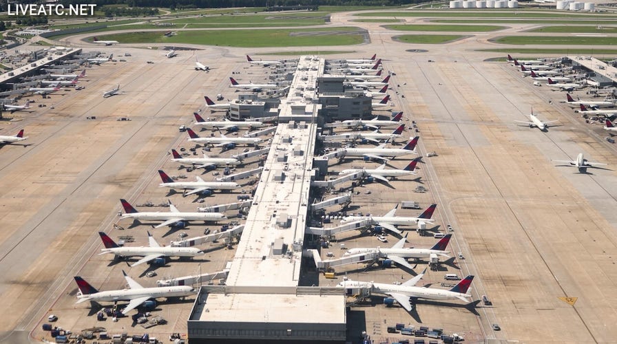Airline passenger yells, then rips open emergency exit in dramatic delay meltdown