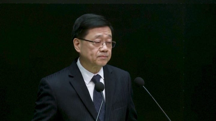 Hong Kong’s chief executive promises reform after fire kills more than 150 people