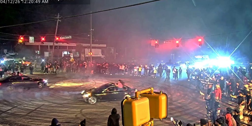 WATCH: Street 'takeover' spirals into chaos as racers swarm roads and cops make arrests