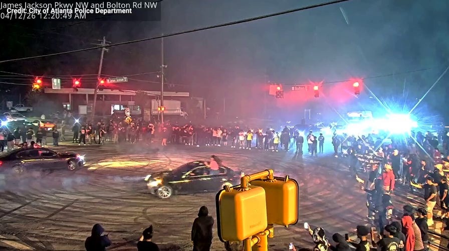 WATCH: Street 'takeover' spirals into chaos as racers swarm roads and cops make arrests