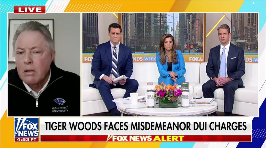 Tiger Woods arrested for DUI aft  rollover car   crash, faces misdemeanor charges