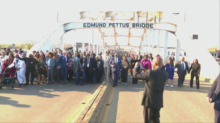 Biden marches with Sharpton in Selma