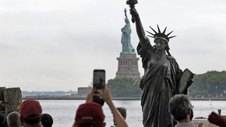 America receives Statue of Liberty replica from France 