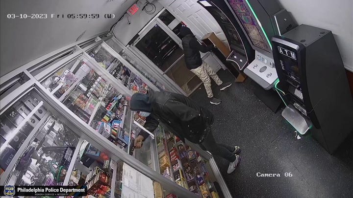 Philadelphia armed robbery suspects try using ax to open ATM