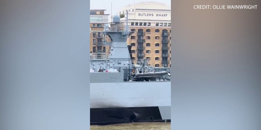 German warship cruises on river blasting Darth Vader theme