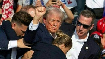 Bodycamera footage reveals harrowing moment Butler responders realized would-be Trump assassin was armed