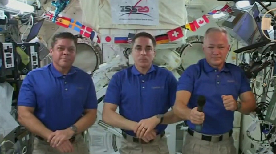 NASA astronauts halfway through mission aboard International Space Station