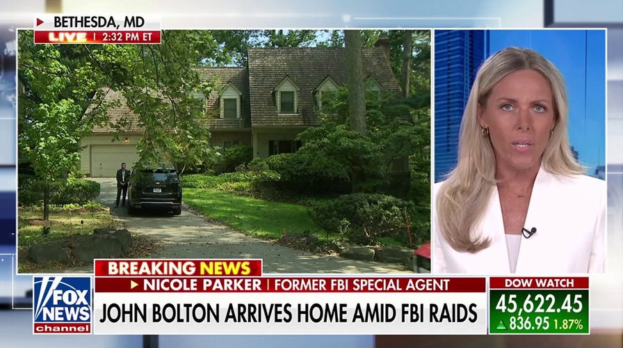 John Bolton returns home after FBI raid