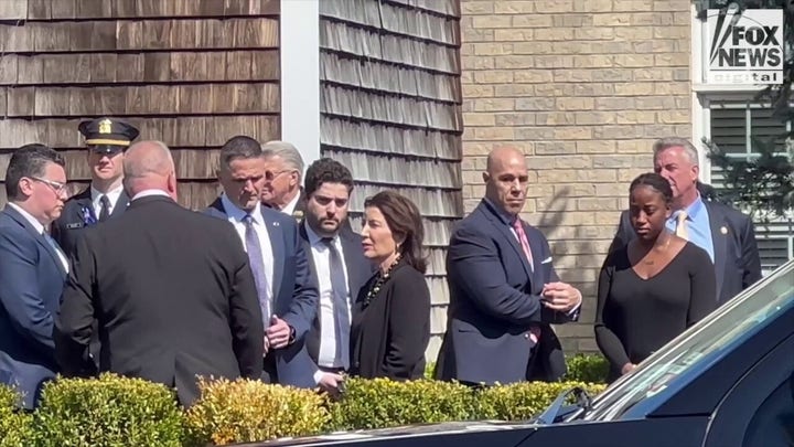 New York Gov. Kathy Hochul is seen at the wake of slain NYPD Officer Jonathan Diller 