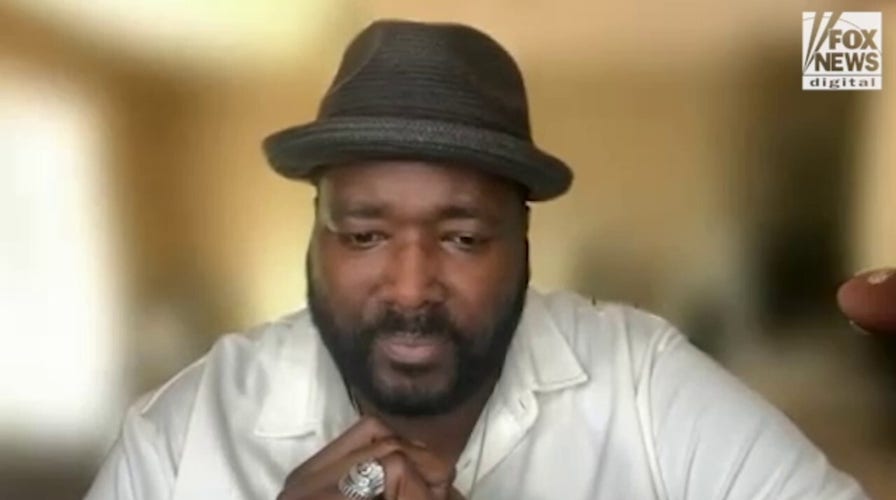 Quinton Aarron describes his relationship with 'The Blind Side' co-star Sandra Bullock