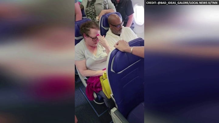 Man removed from flight after bad reaction to crying baby