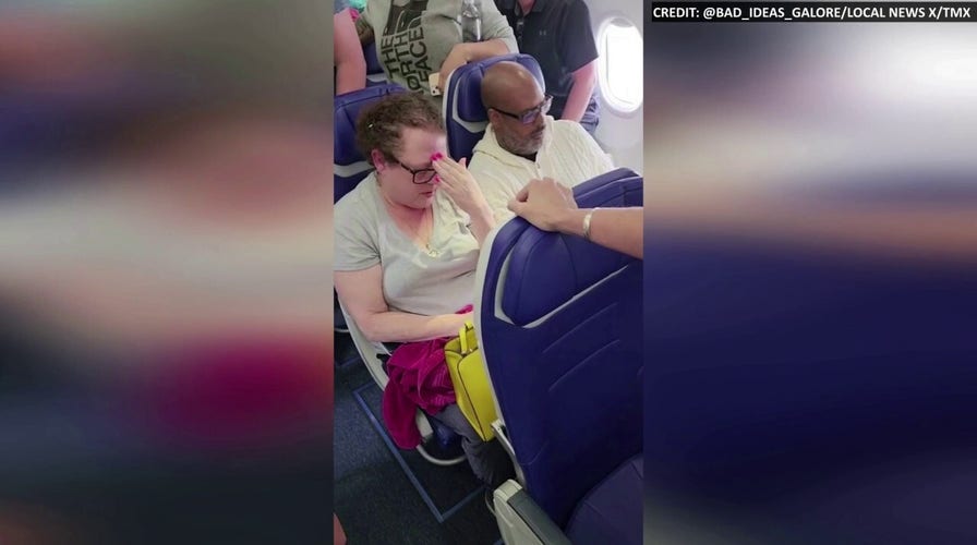 Man removed from flight after bad reaction to crying baby