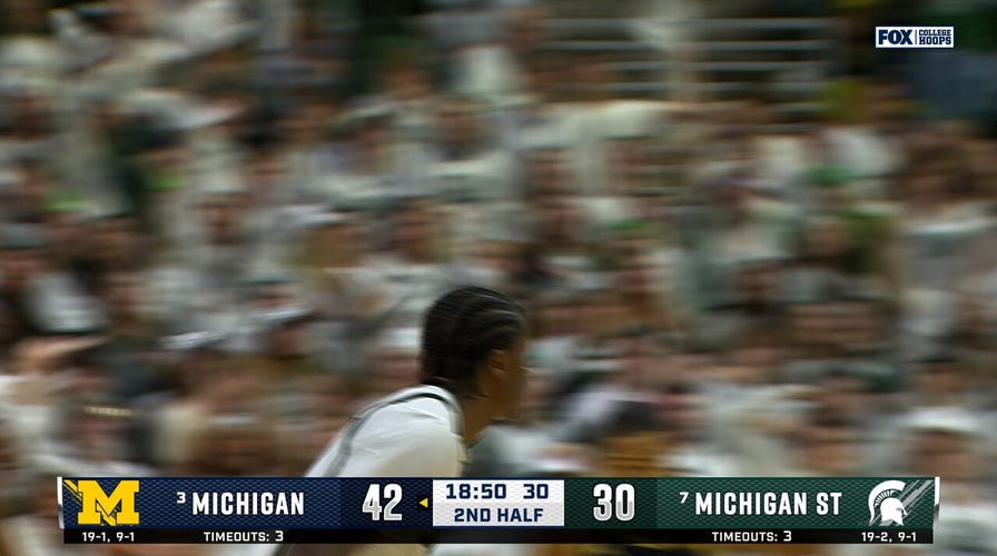 Michigan State's Coen Carr HAMMERS baseline dunk off Jeremy Fears' steal vs. Michigan