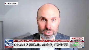 China builds detailed replicas of US warships, jets in desert