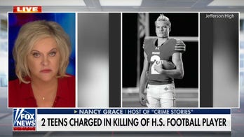 Two teenagers charged in killing of Georgia high school football star