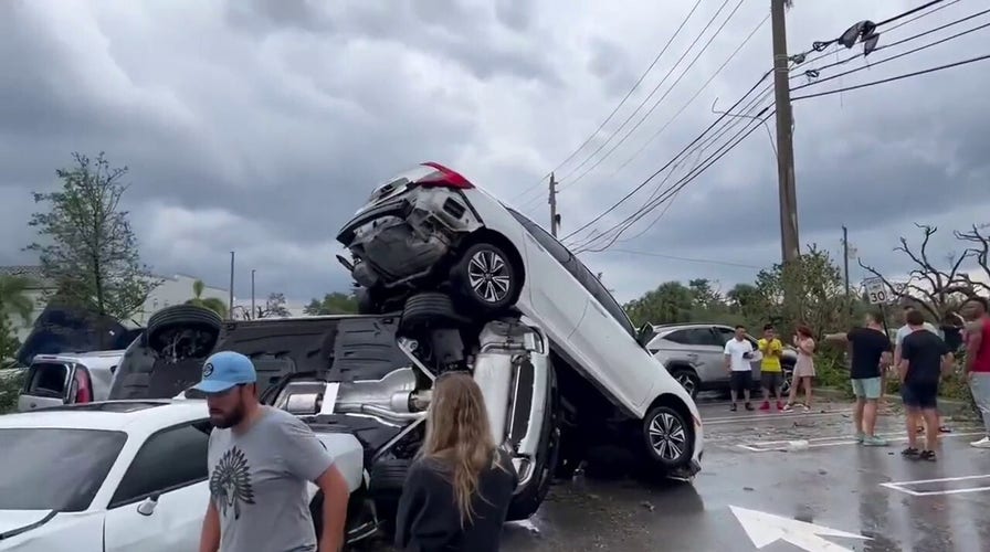 Video shows vehicles in pile after tornado hits Palm Beach Gardens, Florida