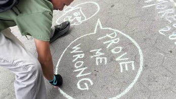 Street artist explains controversial 'Charlie Kirk spots'