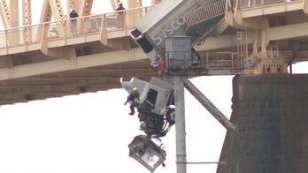 Dashcam video shows moment semi-truck in Kentucky crashes, nearly falls off bridge