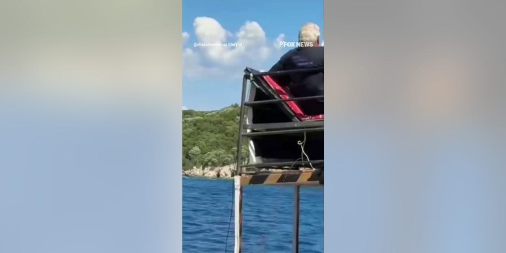 Pirate-themed tourist ship CAPSIZES as people seen jumping off boat