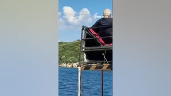 Pirate-themed tourist ship CAPSIZES as people seen jumping off boat