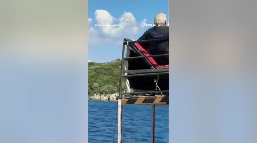 Pirate-themed tourist ship CAPSIZES as people seen jumping off boat