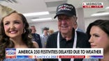 Peter Doocy speaks with WWII hero and performers during weather delay