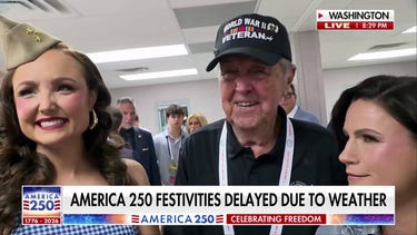 Peter Doocy speaks with WWII hero and performers during weather delay