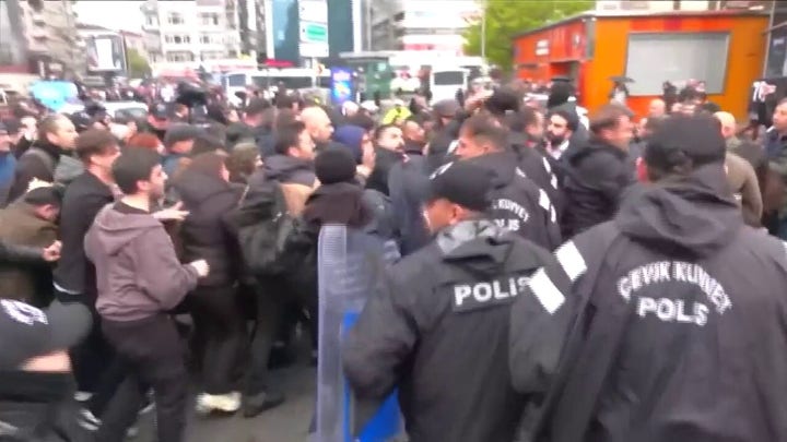 Police and protesters clash during Istanbul May Day march in Turkey