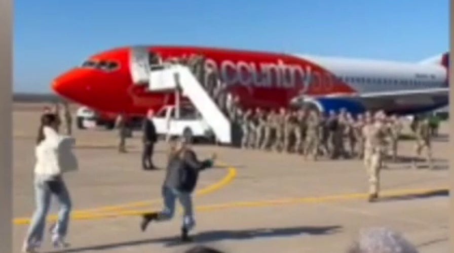 Woman jumps into Nebraska National Guard soldier's arms after 10-month deployment in sweet video