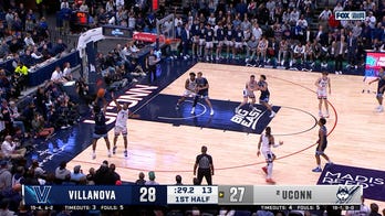 Braylon Mullins hits a corner three, extending Vilanova's lead over UConn