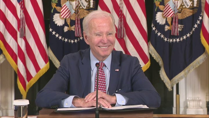Biden laughs at question on ‘politically divisive’ Trump indictment