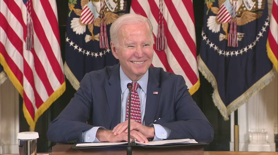 Biden laughs at question on ‘politically divisive’ Trump indictment