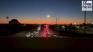 Cars line major roadways leading to Charlie Kirk memorial service