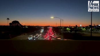 Cars line major roadways leading to Charlie Kirk memorial service