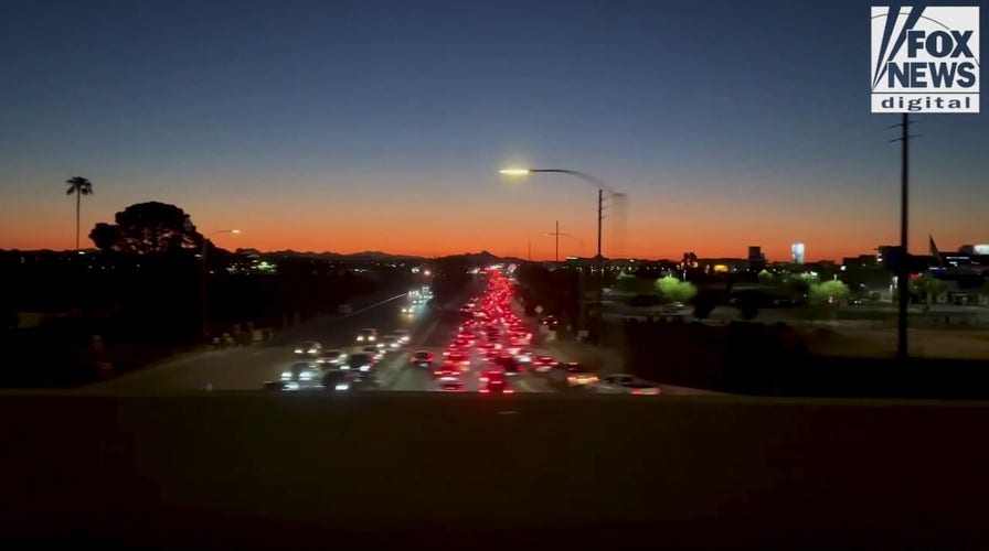 Cars line major roadways leading to Charlie Kirk memorial service