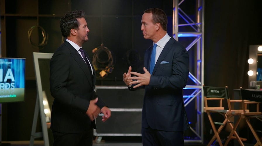 Luke Bryan and Peyton Manning promote the upcoming CMA Awards