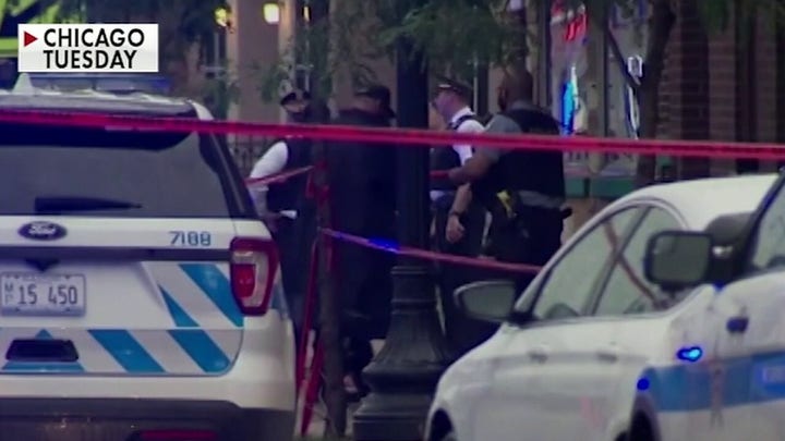 Witnesses describe shooting outside Chicago funeral home as a war zone