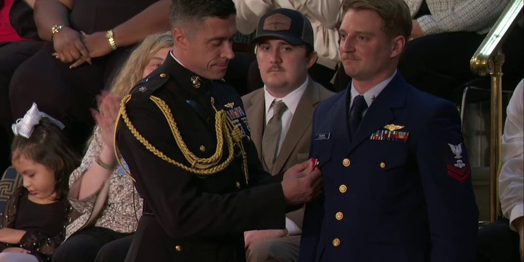 Trump reunites Texas flood survivor with Coast Guard hero