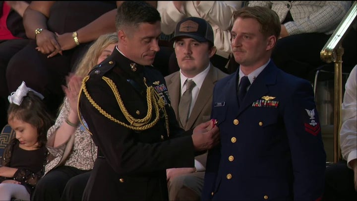 Trump reunites Texas flood survivor with Coast Guard hero