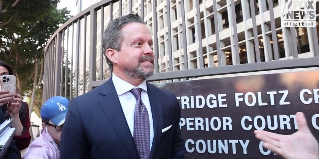 Alan Jackson addresses the media outside of court in Los Angeles