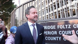 Alan Jackson addresses the media outside of court in Los Angeles