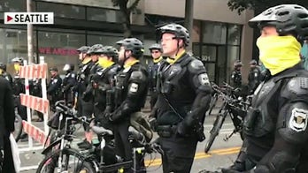 Seattle City Council approves plan to defund police department, slashes jobs and salaries