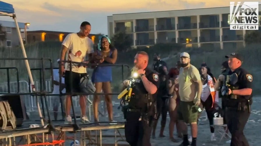 Police clash with Orange Crush Reloaded attendees