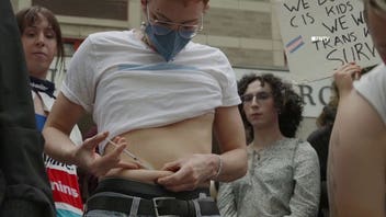 Irate protesters inject themselves with cross-sex hormones in protest of NYU hospital’s agreement with DOJ