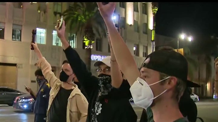 Thousands of protesters march in Los Angeles