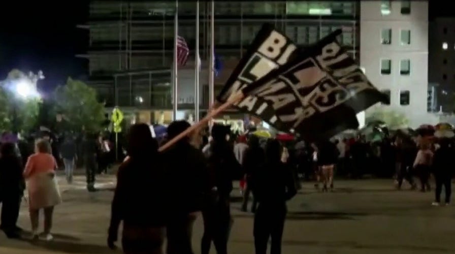 Protesters clash with police, demand justice in death of Daniel Prude