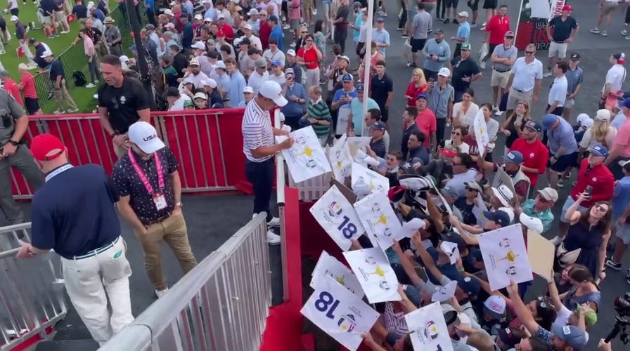 Collin Morikawa signs autographs for Ryder Cup fans