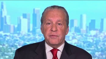 Biden takes flak on college debt