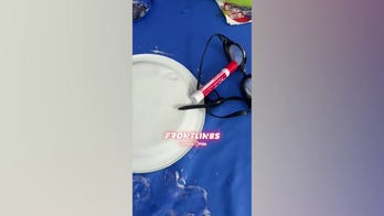 Teacher’s assistant at Illinois State University flips over Turning Point USA table