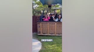 Hot air balloon makes EMERGENCY backyard landing